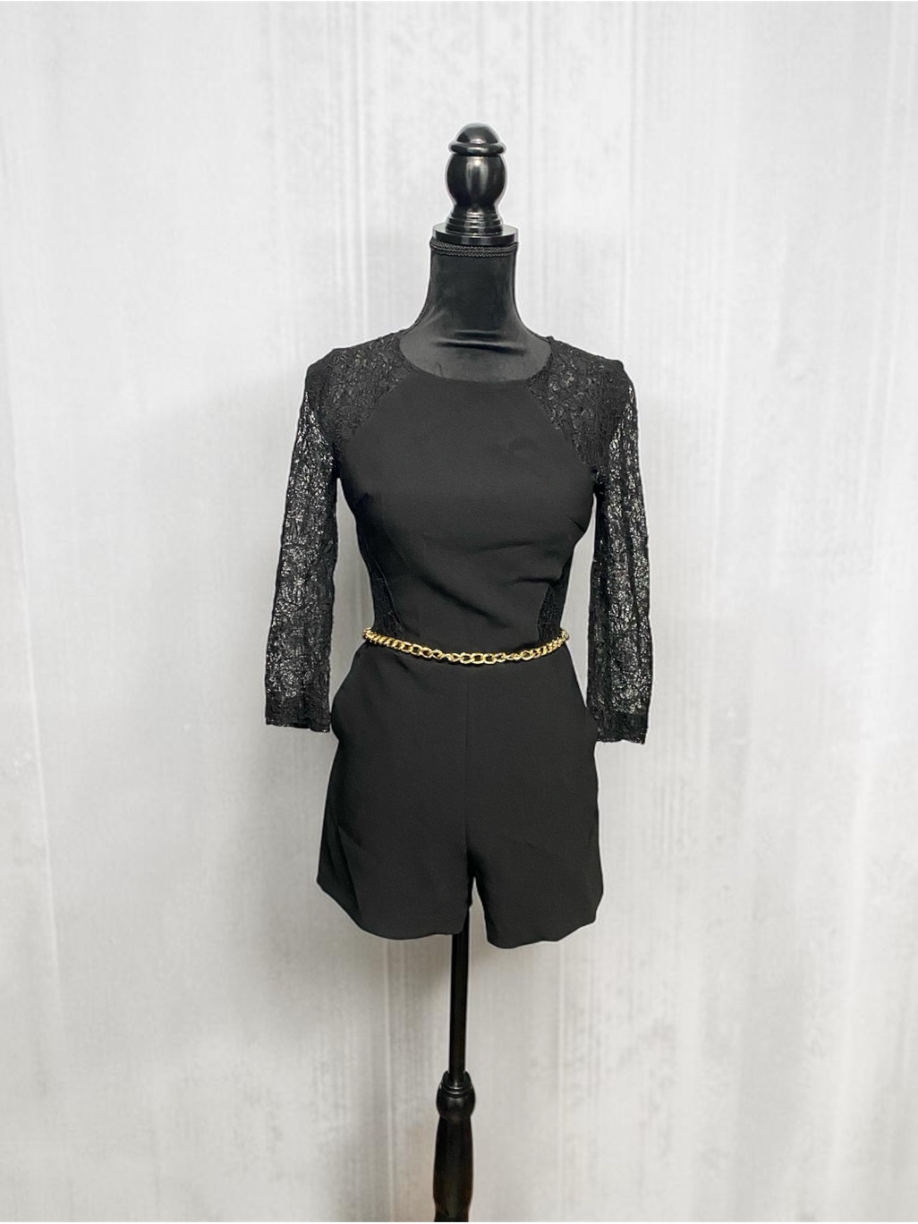 Bebe Black Lace-Sleeve Romper With Gold Chain Belt